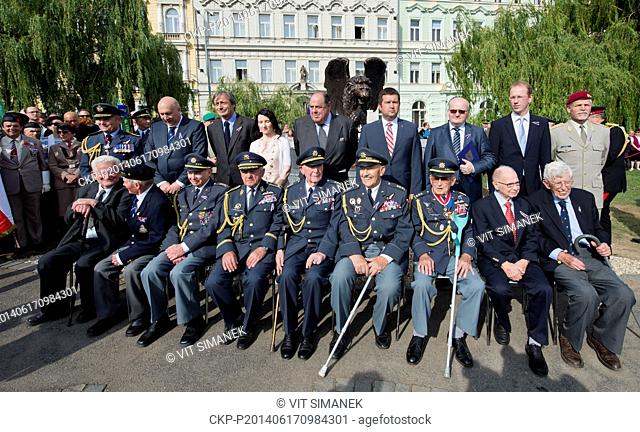 The Speaker of the Chamber of the Deputies of the parliament of the Czech Republic Jan Hamacek (standing fourth from right) unveils the monument in memory of...