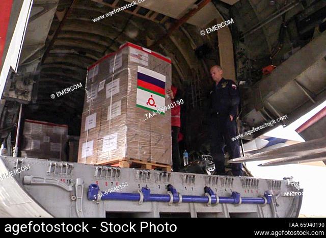 EGYPT - DECEMBER 20, 2023: Men unload humanitarian aid from an Ilyushin Il-76 strategic airlifter as Russia's Emergency Situations Ministry sends more than 18t...