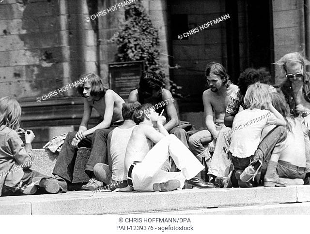 The Kaiser Wilhelm Memorial Church is a meeting point of many adolescents and loafers in Berlin during the midsummer temperatures in July 1973