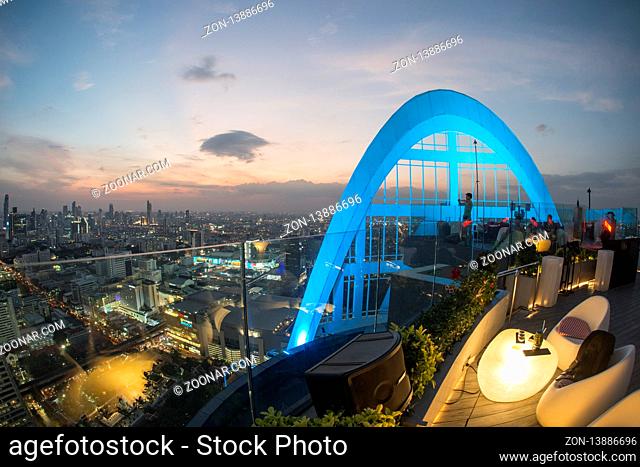 the Skyline of Bangkok by night and view from the Cru Bar of the Centara Grand Hotel in the city of Bangkok in Thailand in Southeastasia