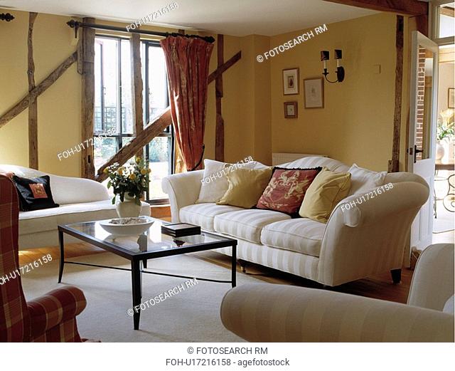 Cream sofa in traditional cottage living room