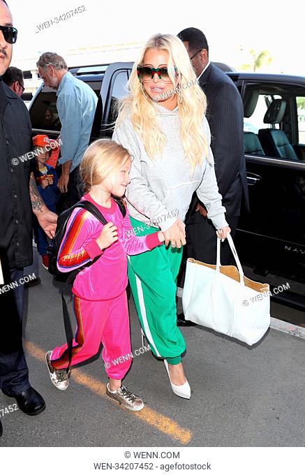 Jessica Simpson and Eric Johnson arrive at LAX airport in Los Angeles, United States Featuring: Jessica Simpson, Maxwell Drew Johnson Where: Lax, California