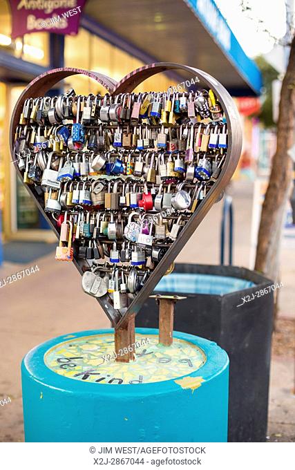 Tucson, Arizona - Lock Your Love sculpture on Fourth Avenue. Sweethearts inscribe their names on a local, place it on the sculpture