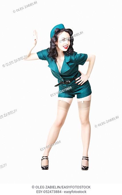 Portrait of Beautiful Brunette with black hair. Pin up Female Dressed in military clothing Uniform and Garrison cap. Army Pin-up Girl Concept