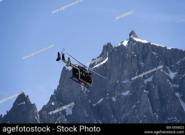 Helicopter in front of the summit of the Aiguille du Midi, Alpine rescue, mountain rescue, Mont Blanc massif, Chamonix, Haute-Savoie, France, Europe