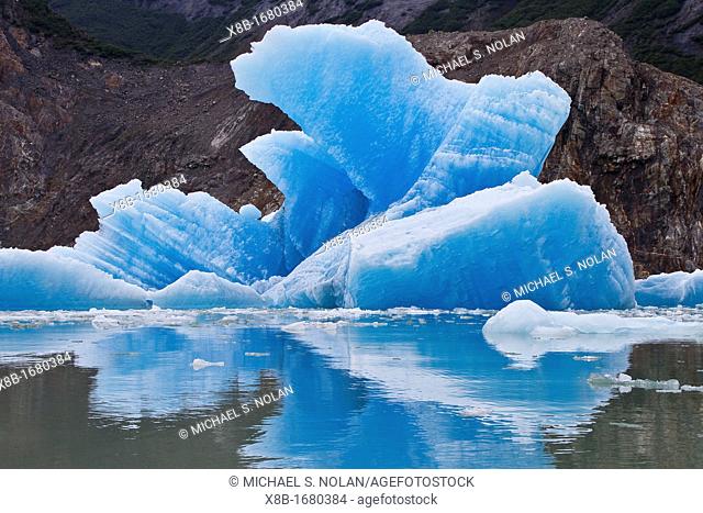 Glacial iceberg from ice calved off the South Sawyer Glacier in Tracy Arm, Southeast Alaska, USA, Pacific Ocean