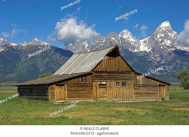 The Moulton Barn on Mormon Row with the Grand Tetons range in background, Antelope Flats Road, Grand Teton National Park, Wyoming, United States of America