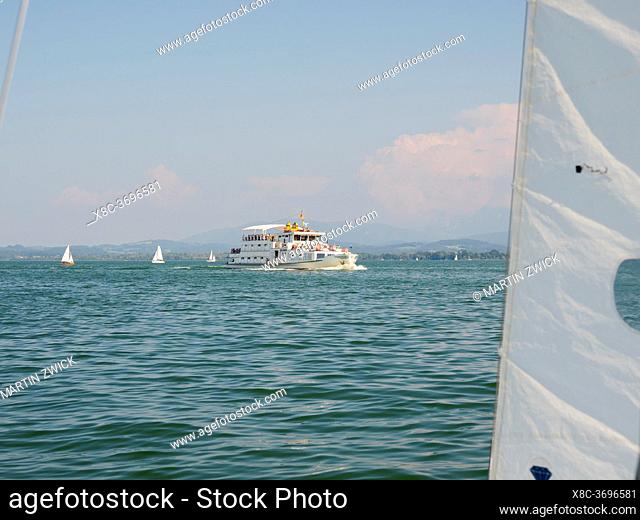 Sailing on lake Chiemsee. Lake Chiemsee in the Chiemgau. The foothills of the Bavarian Alps in Upper Bavaria, Germany