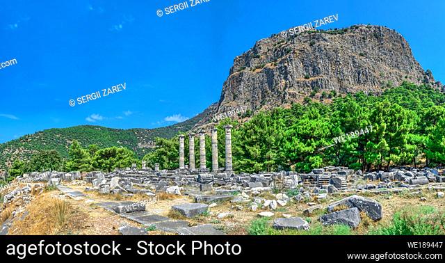 Ruins of the Temple of Athena Polias in the ancient city of Priene, Turkey, on a sunny summer day. Big panoramic shot