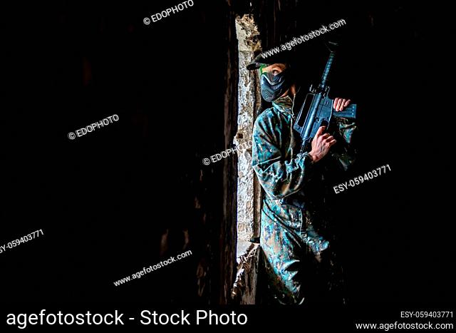 soldier training while playing paintball in the fortress
