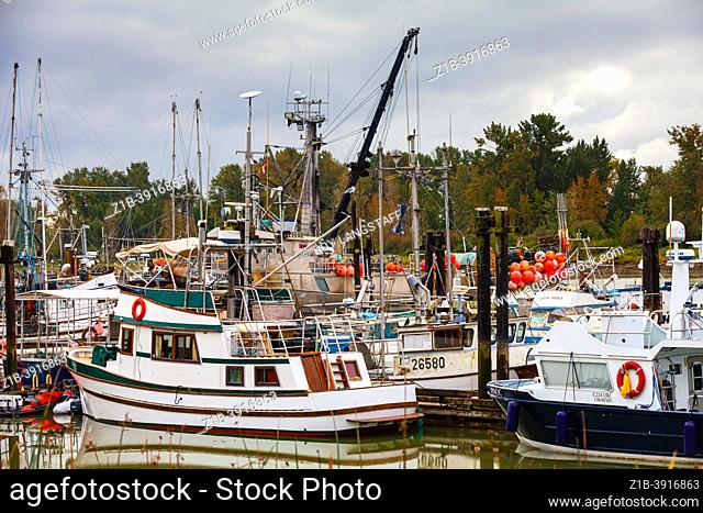 Busy scene of working boats in Steveston Harbour near the Britannia Ship Yard in British Columbia Canada