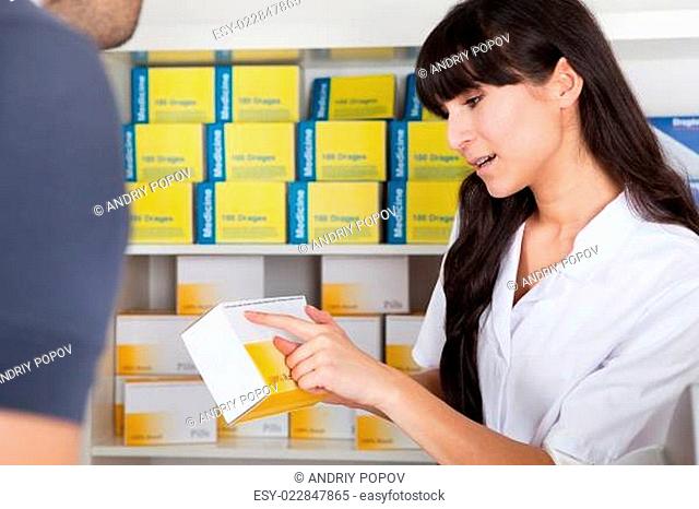 Men buying medicine at the drugstore