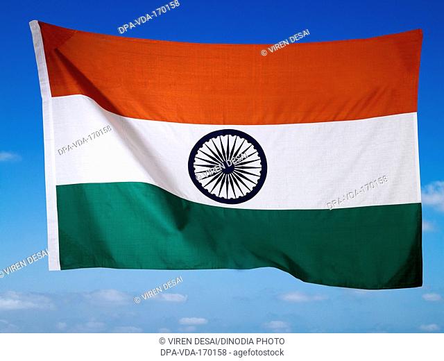 Indian national flag against blue sky