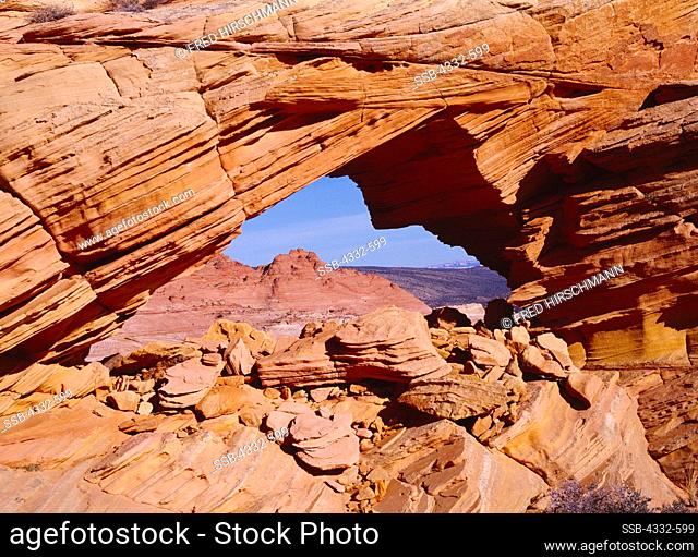 Arch in cross-bedded and wind-sculpted Navajo Sandstone, Vermilion Cliffs National Monument, Paria-Vermilion Cliffs Wilderness, Arizona