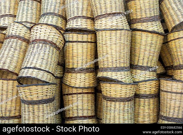 Empty wicker baskets are seein a market place