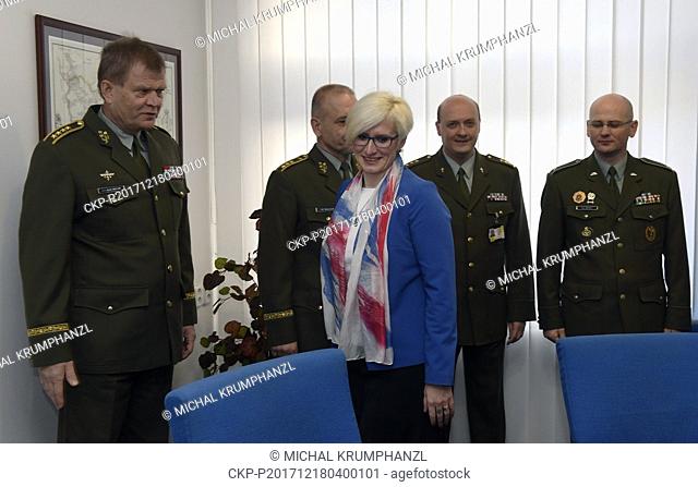 Defence Minister Karla Slechtova, centre, visits general staff, and meets chief of staff Josef Becvar, left, Monday, December 18, 2017