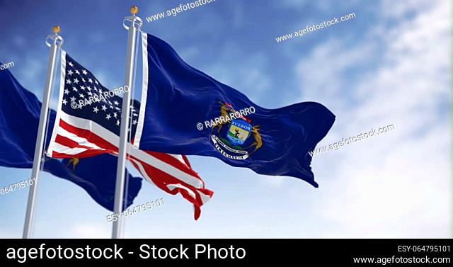 Two flags of the state of Michigan waving in the wind with the national flag of the United States. 3d illustration render. Rippling fabric