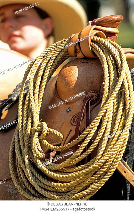 France, Aveyron, Onet le Chateau, Puech Maynade Ranch, a lasso attached to the saddle of a horse, typical of the cowboy equipment