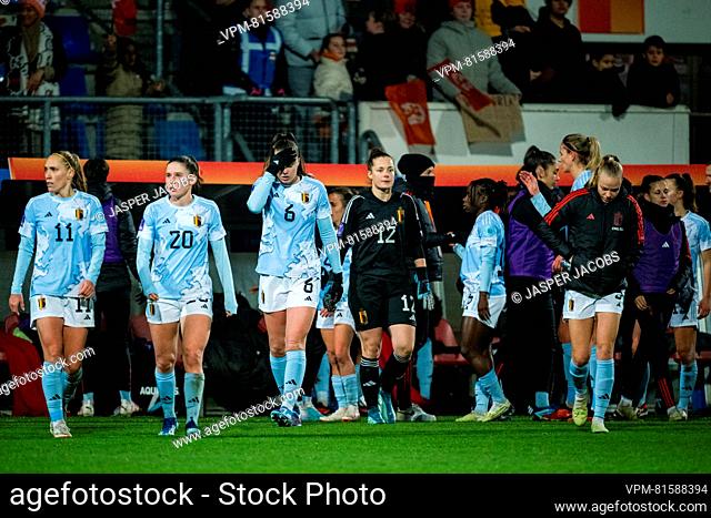 Belgium's players look dejected after a soccer match between Belgium's national women's team the Red Flames and the Netherlands