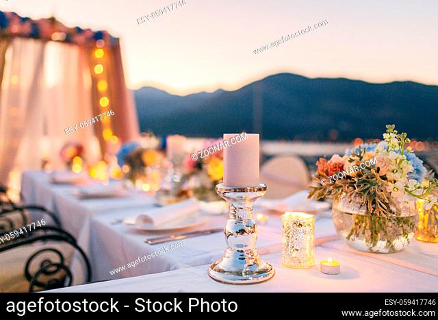 Candles on the wedding table at a banquet in Montenegro