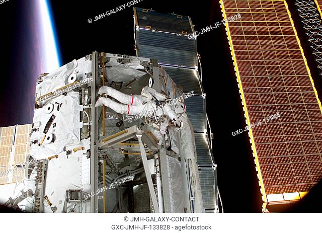 Astronaut Steven L. Smith, STS-110 mission specialist, works near the S0 (S-Zero) Truss on the International Space Station (ISS) during the first scheduled...
