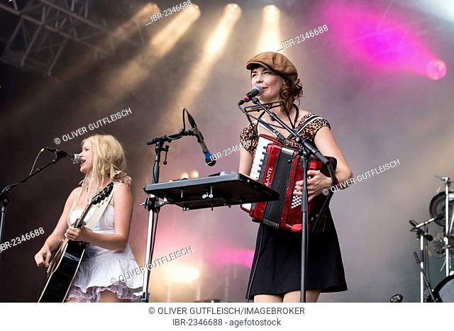 Solveig Heilo with a guitar and Anne Marit Bergheim with an accordion from the Norwegian girl band Katzenjammer performing live at Heitere Open Air in Zofingen