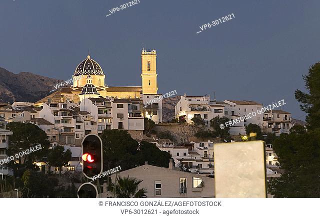 Views of Altea dusk with its church Our Lady of Consuelo standing out in the plane