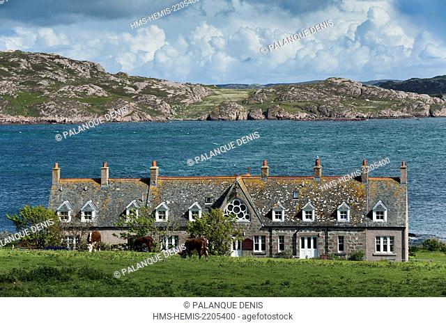 United Kingdom, Scotland, Hebrides, Isle of Iona, Bishop's House and Episcopal Church view from the terrace of Saint Colomba Hotel