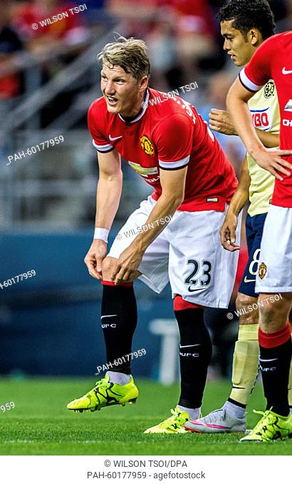 Manchester United's Bastian Schweinsteiger pulls up his socks during the soccer friendly match between Manchester United and Club America at the Century Link...