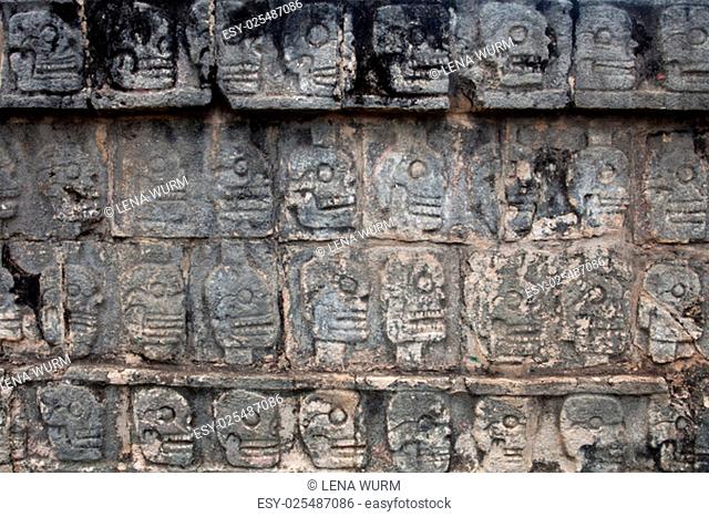 Tzompantli, wall of skulls at Chichen Itza Toltec Maya Ruins, Yucatan Peninsula, Mexico