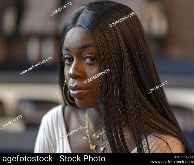 Dark skinned young woman, portrait, Düsseldorf, Germany, Europe