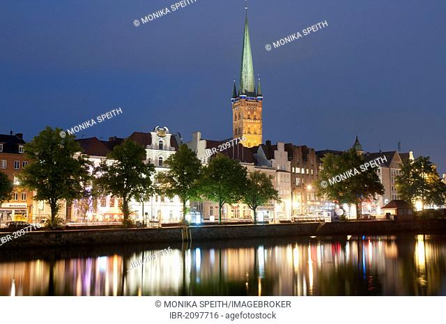 Cityscape on Obertrave river at night, Hanseatic city of Luebeck, UNESCO World Heritage Site, Luebeck Bay, Baltic Sea, Schleswig-Holstein, Germany, Europe