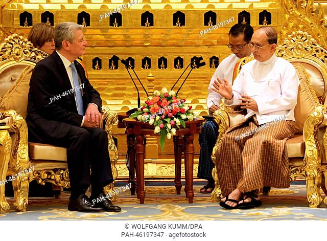 German President Joachim Gauck is welcomed by Myanmar President Thein Sein (R) at the President's palace in Naypyidaw, Myanmar, 10 February 2014