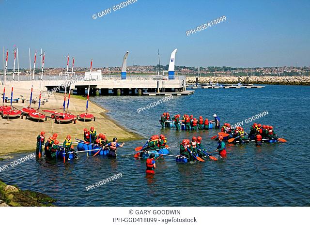 Children on a rafting adventure at the Weymouth & Portland Sailing Academy on Portland Harbour. Venue for the 2012 Olympic sailing events