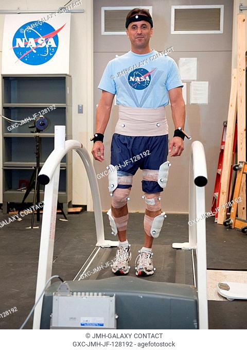NASA astronaut Joe Acaba, Expedition 3132 flight engineer, participates in a treadmill kinematics baseline data collection session in the Planetary and Earth...