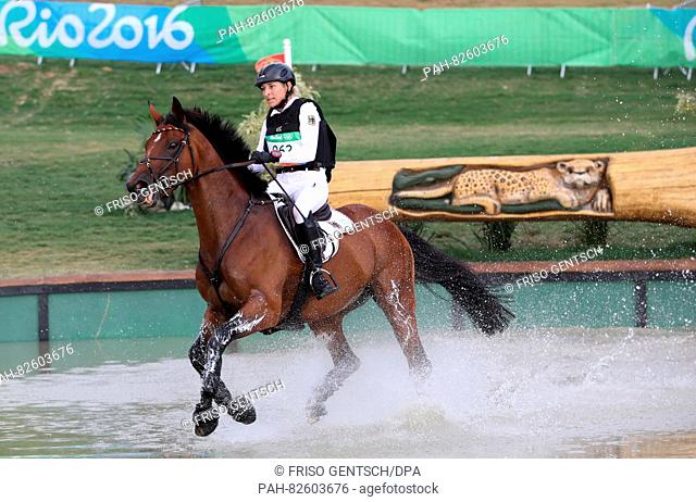 Ingrid Klimke of Germany on horse Hale-Bob Old in action during the Eventing Cross Country of the Equestrian events at the Rio 2016 Olympic Games at the Olympic...