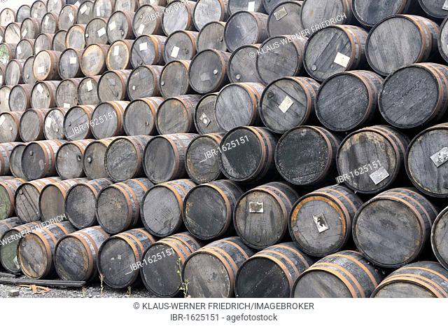 Stack of whiskey barrels, Locke's Distillery, the oldest licensed whiskey distillery in the world, Kilbeggan, Westmeath, Midlands, Ireland, Europe
