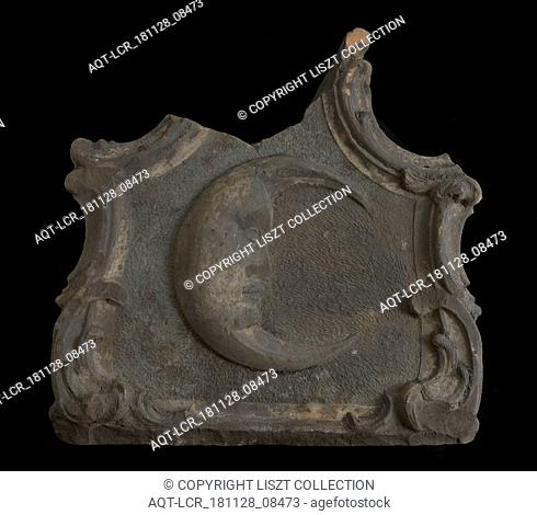 Fragment of facing brick, half moon with human face in frame, facing brick fragment sculpture sculpture building component sandstone stone