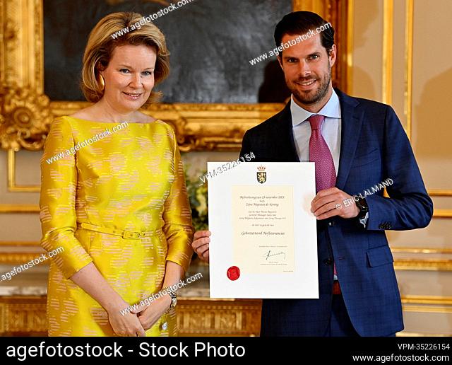 Queen Mathilde of Belgium and Bruno Buyssens, General manager sales of Sony Belgium pictured during a royal reception with the newly appointed suppliers holding...