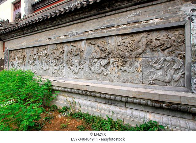 nine dragon wall in a temple, Chinese ancient architecture landscape