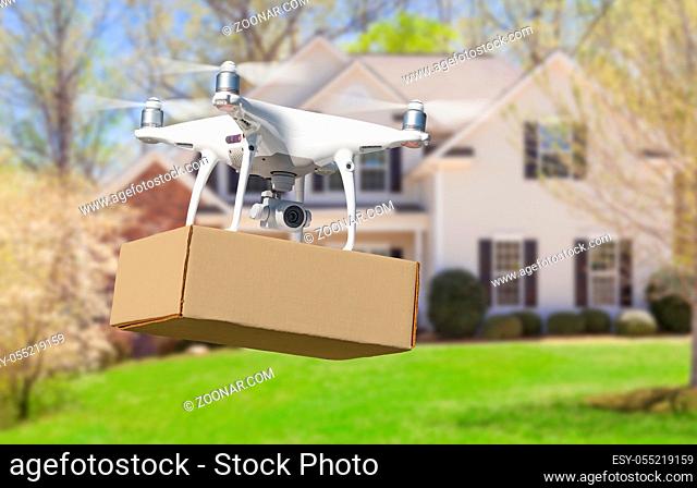Unmanned Aircraft System (UAV) Quadcopter Drone Delivering Package To House