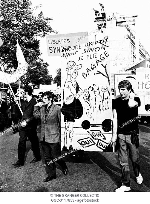 PARIS STUDENT REVOLT, 1968.Students carrying a caricature of French President Charles de Gaulle as a strongman at a demonstration in Paris, late May 1968
