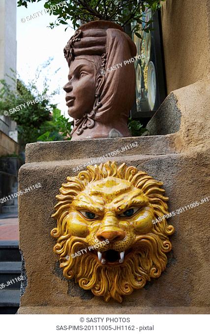 Lion sculpture on a wall, Taormina, Province of Messina, Sicily, Italy