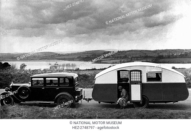 1930 Morris Oxford Six with Winchester Streamline caravan. Creator: Unknown