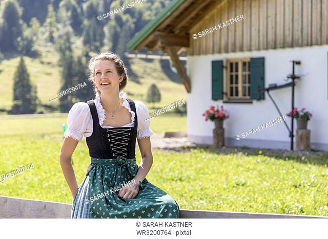Portrait of a young countrywoman with dirndl