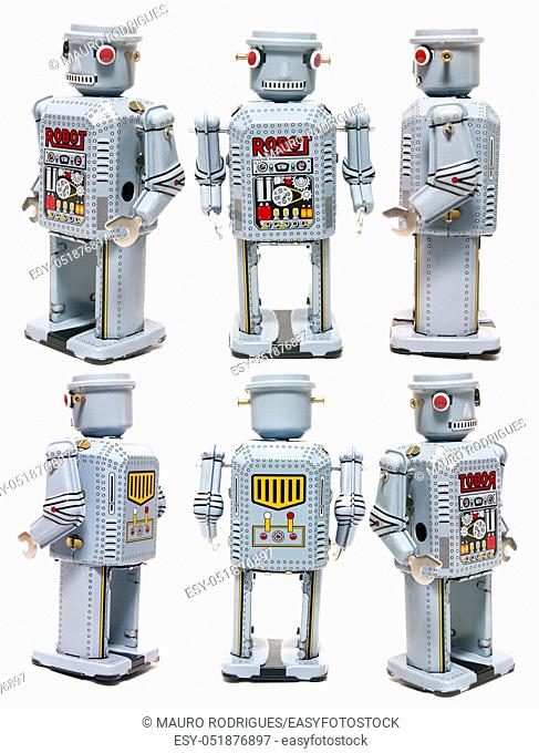 Vintage tin robot toy isolated on a white background