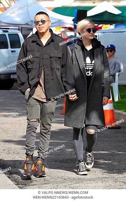 Ashlee Simpson and husband Evan Ross holding hands on a romantic outing at the Studio City Farmers Market where they bought six containers of fresh salsa