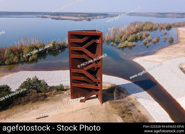 25 March 2022, Brandenburg, Senftenberg: The observation tower ""Rusty Nail"" in front of Lake Koschen. On April 2, 2022