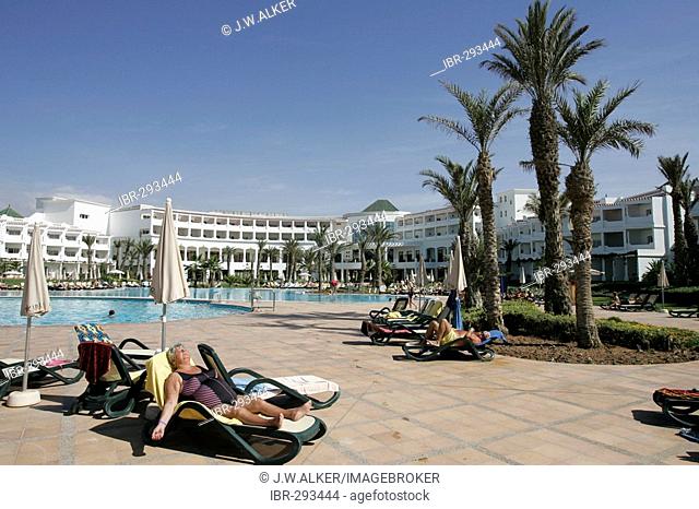 Tourists at the pool of the Hotel Iberostar Founty Beach, Agadir, Morocco, Africa
