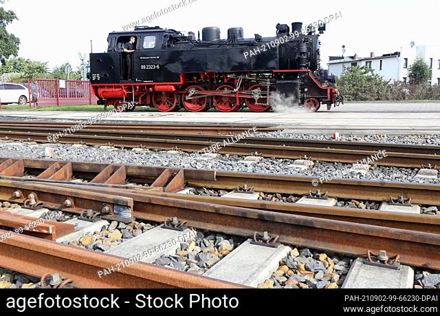 02 September 2021, Mecklenburg-Western Pomerania, Bad Doberan: A locomotive of the Molli narrow-gauge railway shunts at the station